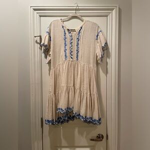 Cream and blue free people dress with floral trim and bottom details